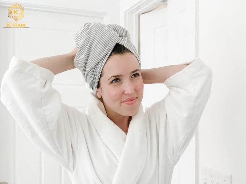 Using a warm towel to help the cuticles to open slightly