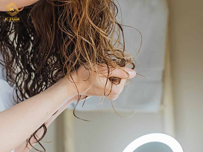 Scrunching your hair can help bring out more curl formation