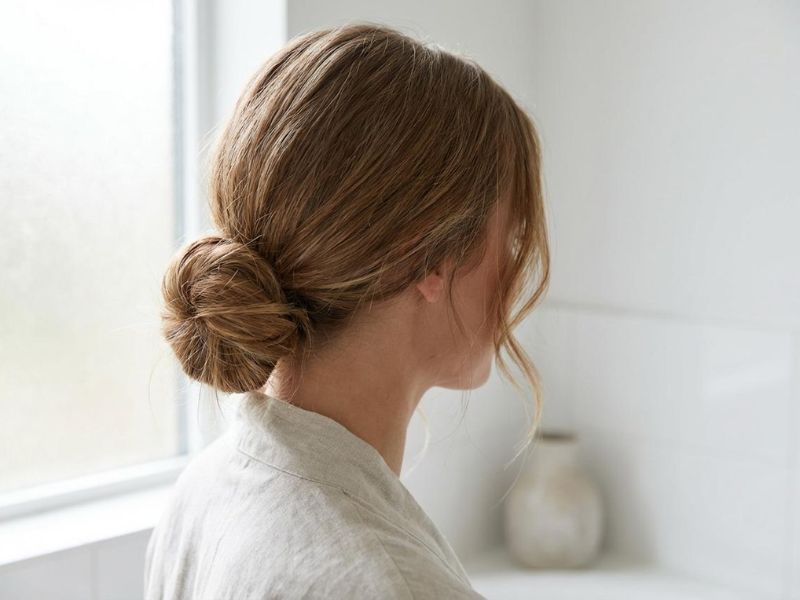 How to Straighten Hair Without Heat: 7 Easy Methods 6 Low bun method to smooth damp hair without heat